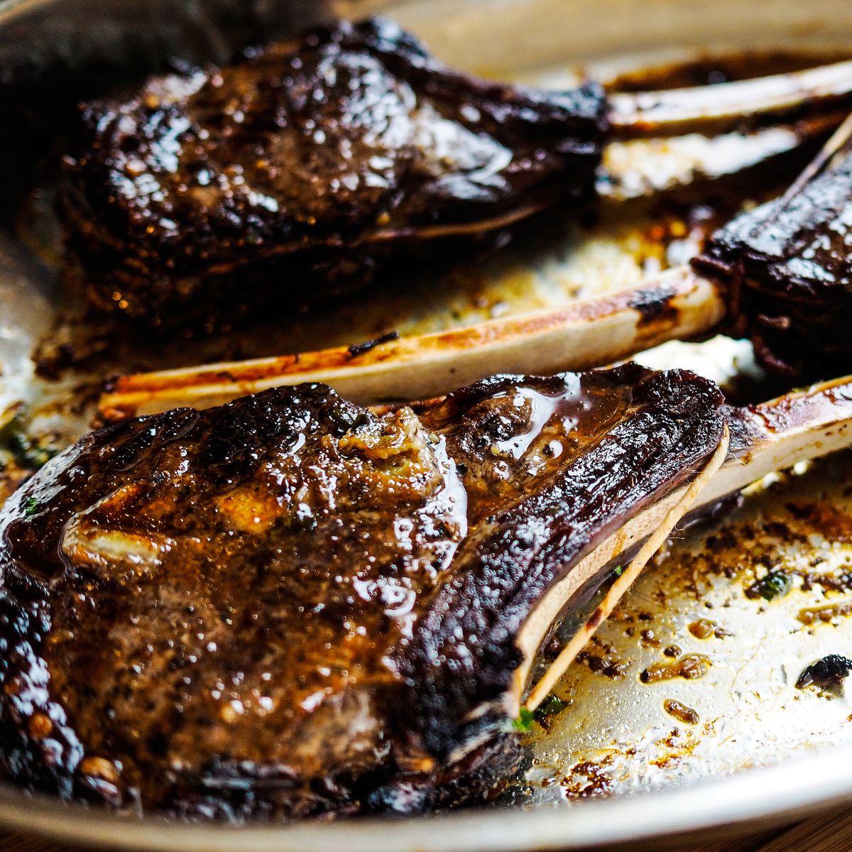 Overcooked Venison cuts on a white plate